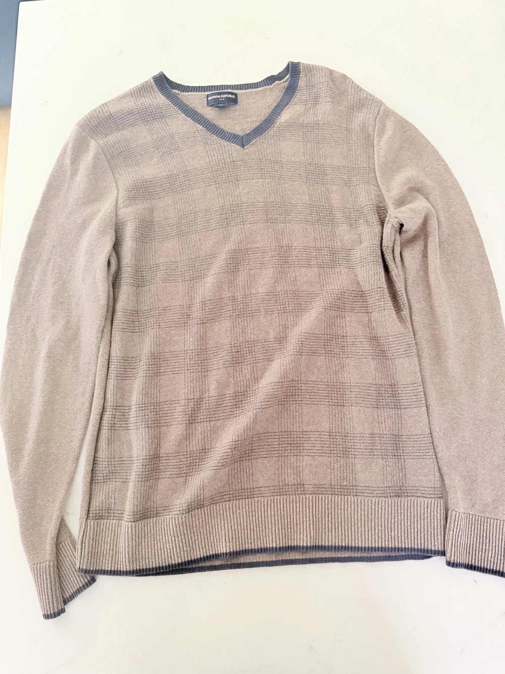 Brown checkerboard two-toned v-neck sweater